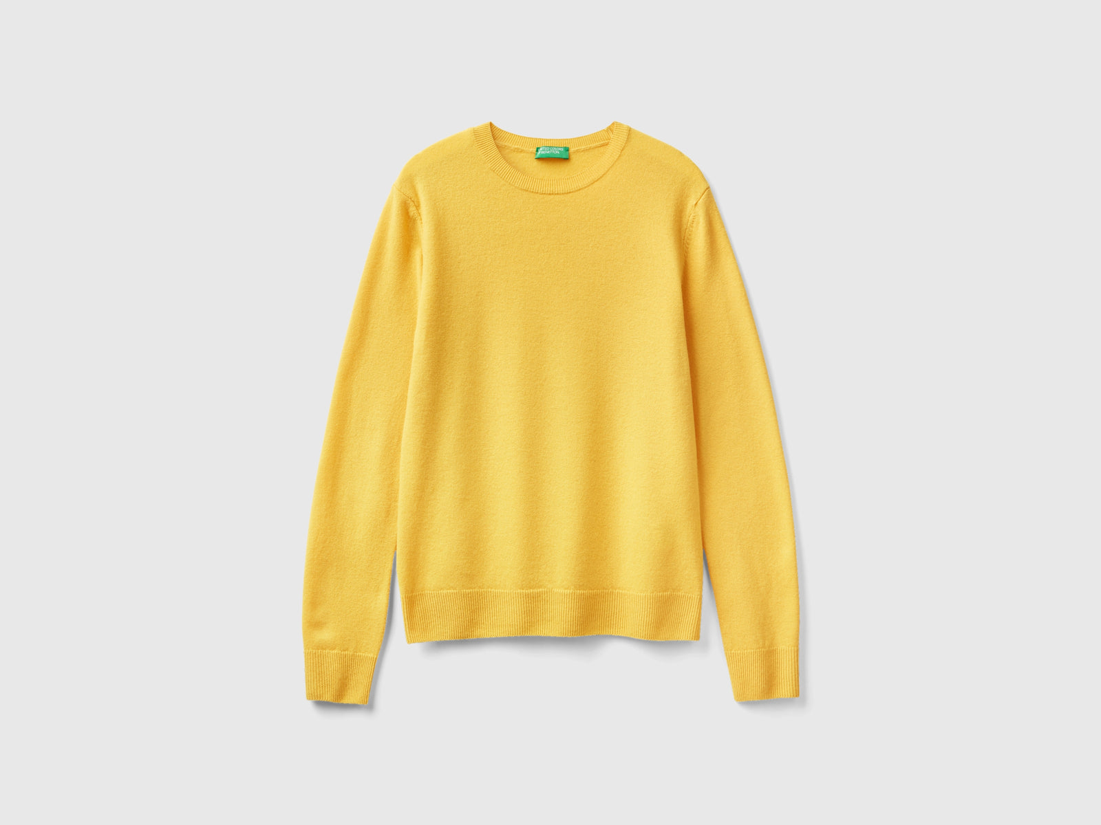 Suéter de cuello redondo de lana merino da donna giallo | Benetton Outlet
