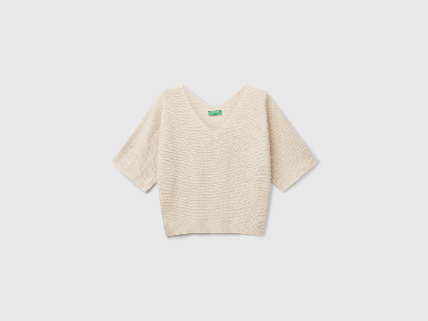 Maglia reversibile cropped da donna beige | Benetton Outlet