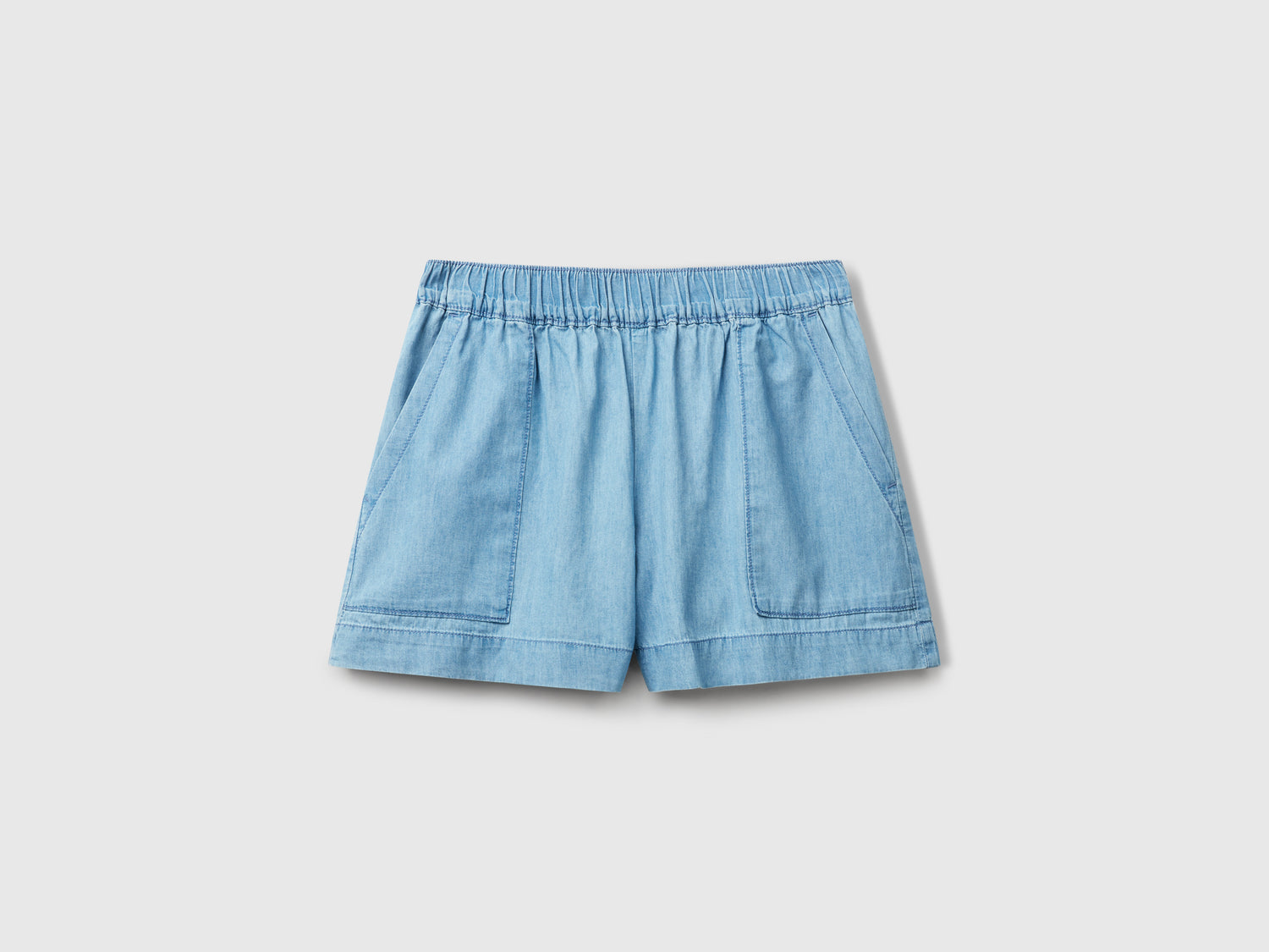 Shorts in chambray da donna azzurro | Benetton Outlet