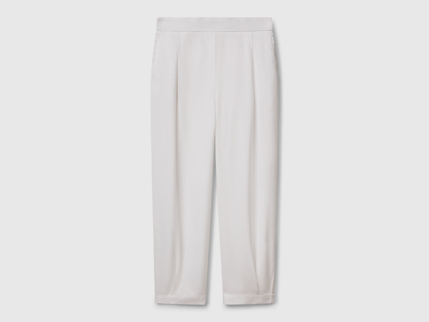 Pantaloni fluidi con pinces da donna bianco | Benetton Outlet