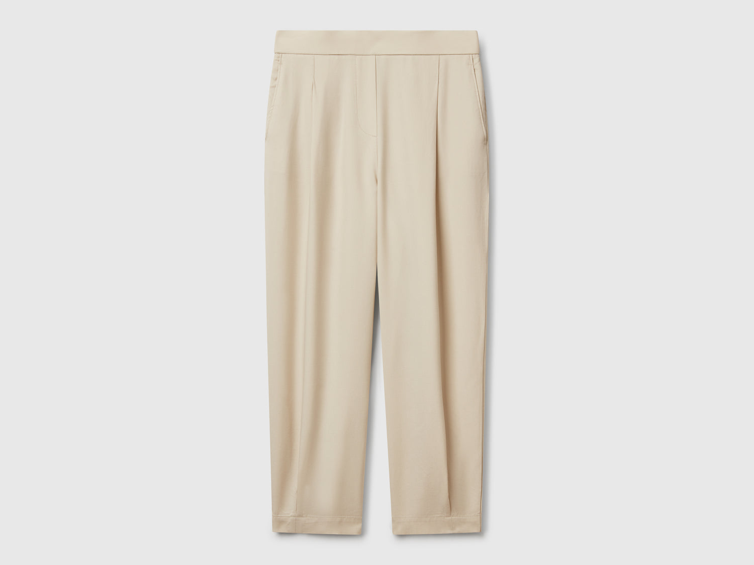 Pantaloni fluidi con pinces da donna beige | Benetton Outlet