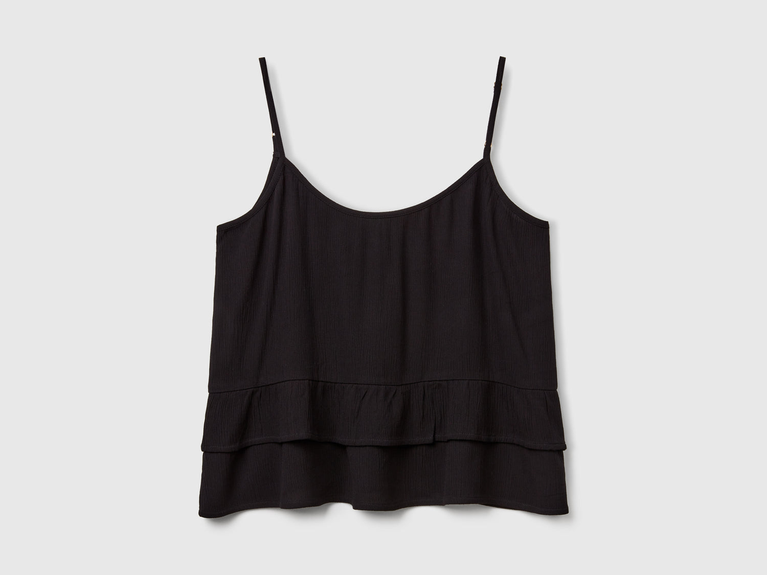 Flowing top with ruffle da donna nero | Benetton Outlet