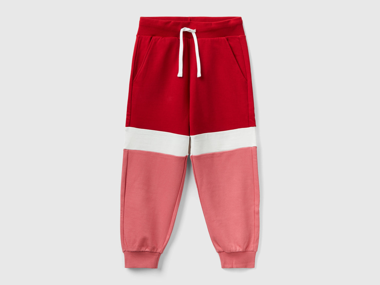 Joggers rosa e rossi da bambino rosso mattone | Benetton Outlet