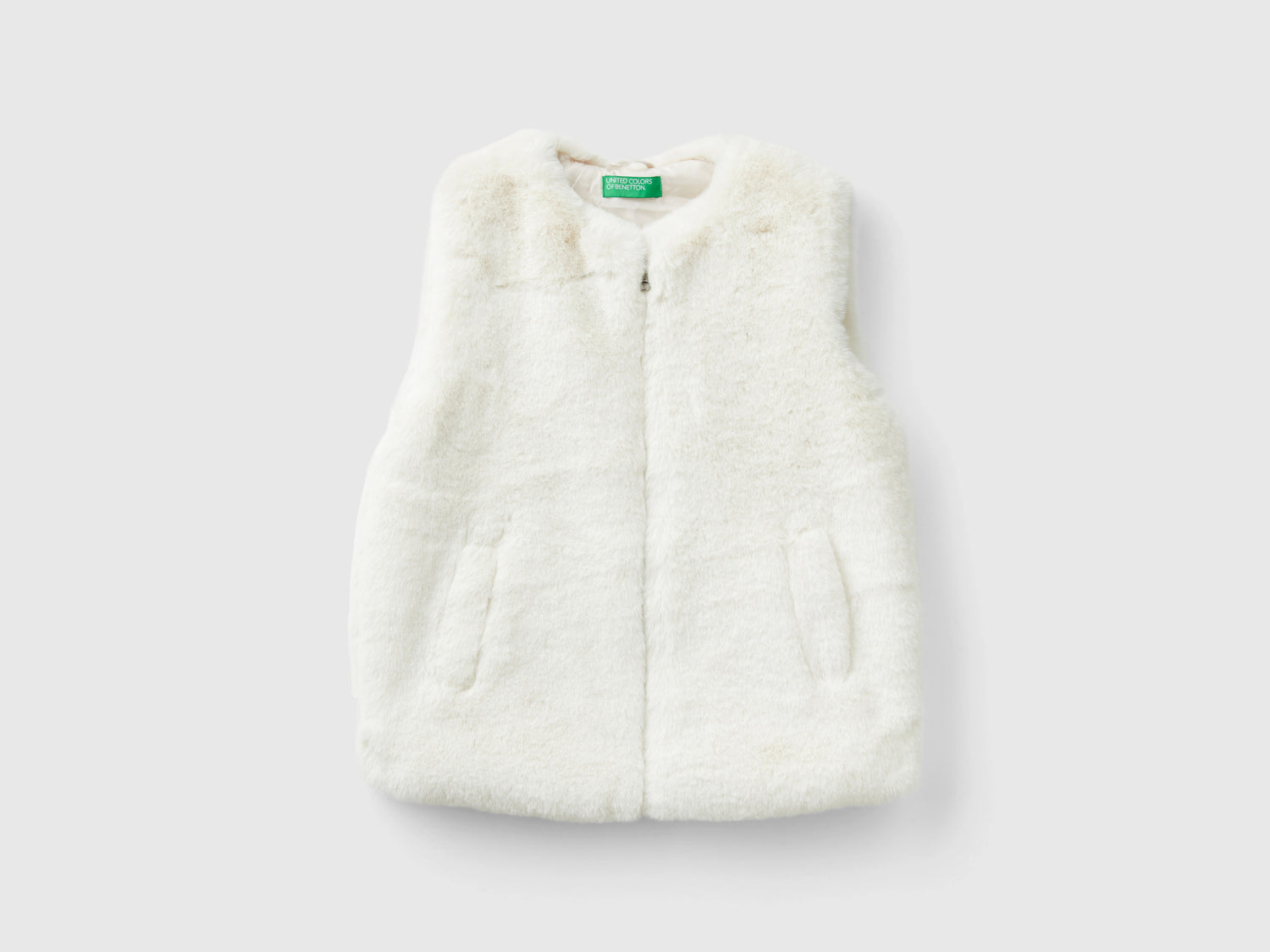 Gilet in pelliccetta sintetica da bambina bianco panna | Benetton Outlet