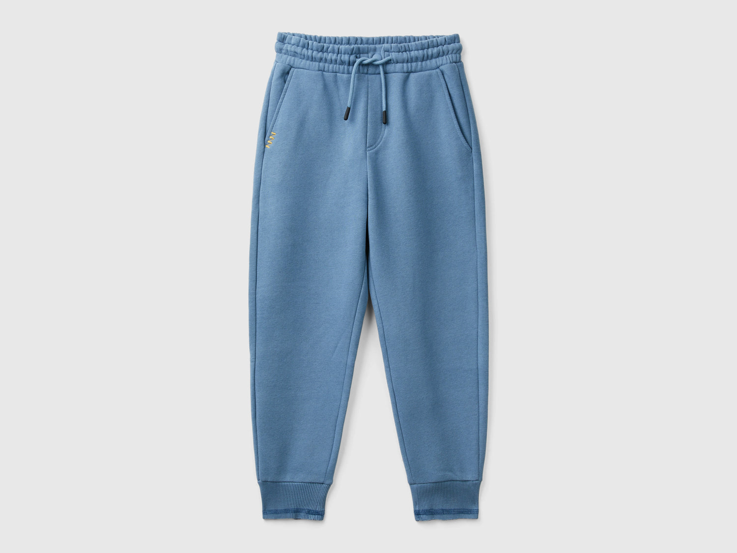 Pantaloni in calda felpa con stampa da bambino avio | Benetton Outlet