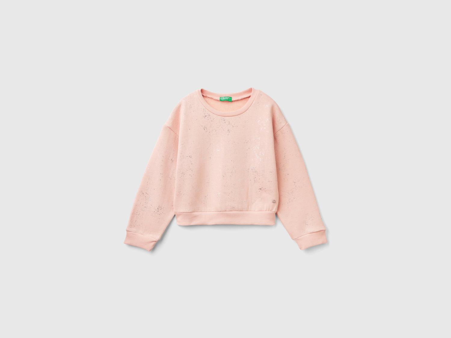 Felpa over fit con brillantini da bambina beige | Benetton Outlet