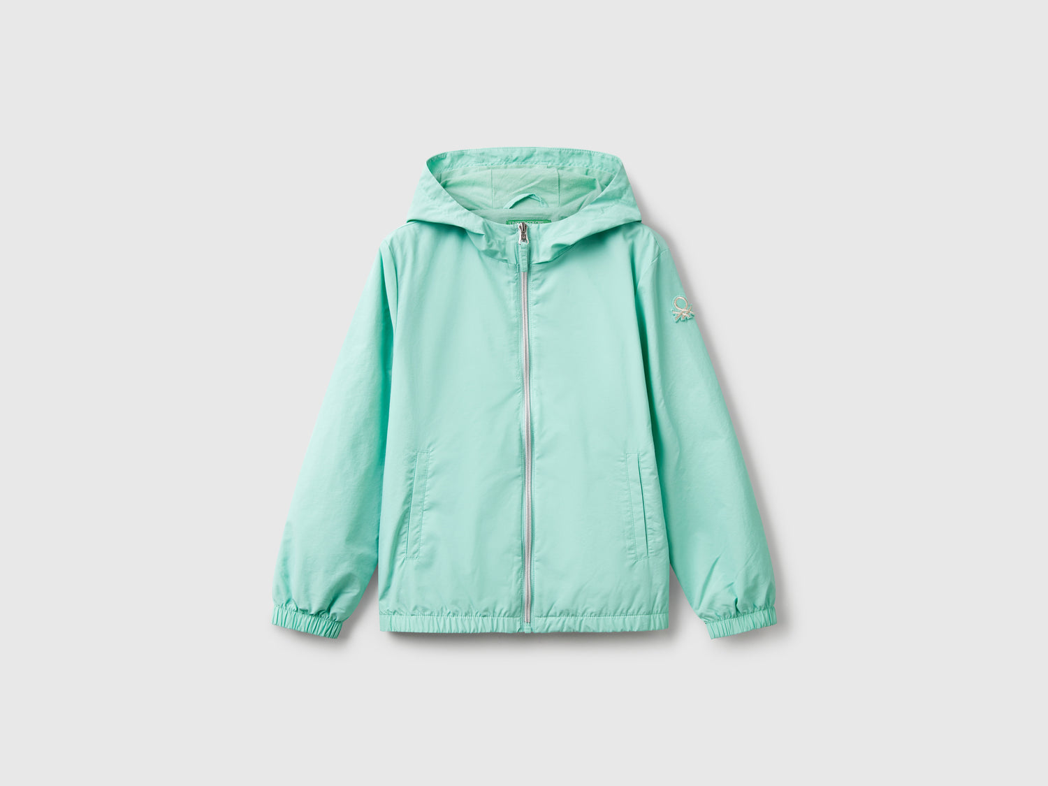 Giacca leggera "Rain Defender" da bambina verde acqua | Benetton Outlet