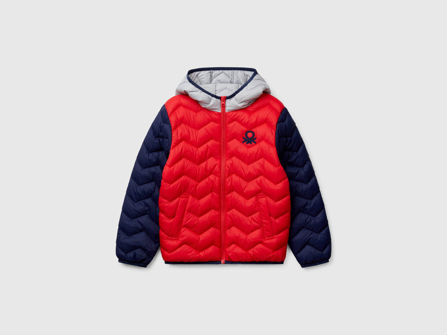 Giubbotto imbottito con cappuccio da bambino multi-color | Benetton Outlet