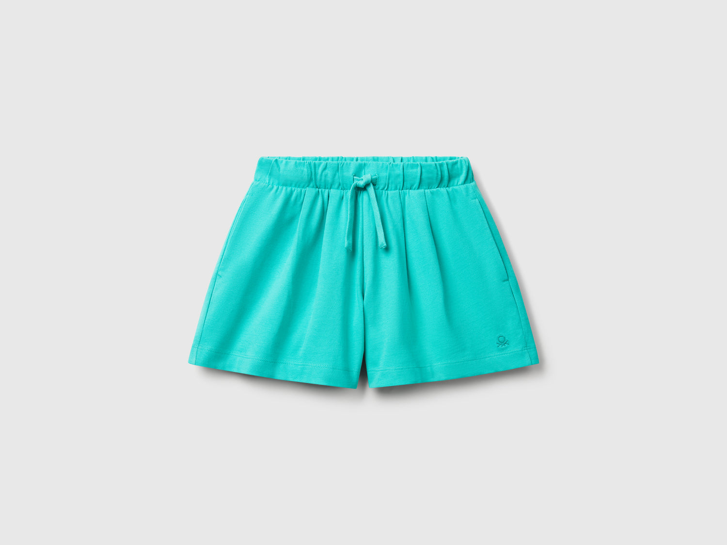 Shorts in puro cotone da bambina celeste fluo | Benetton Outlet