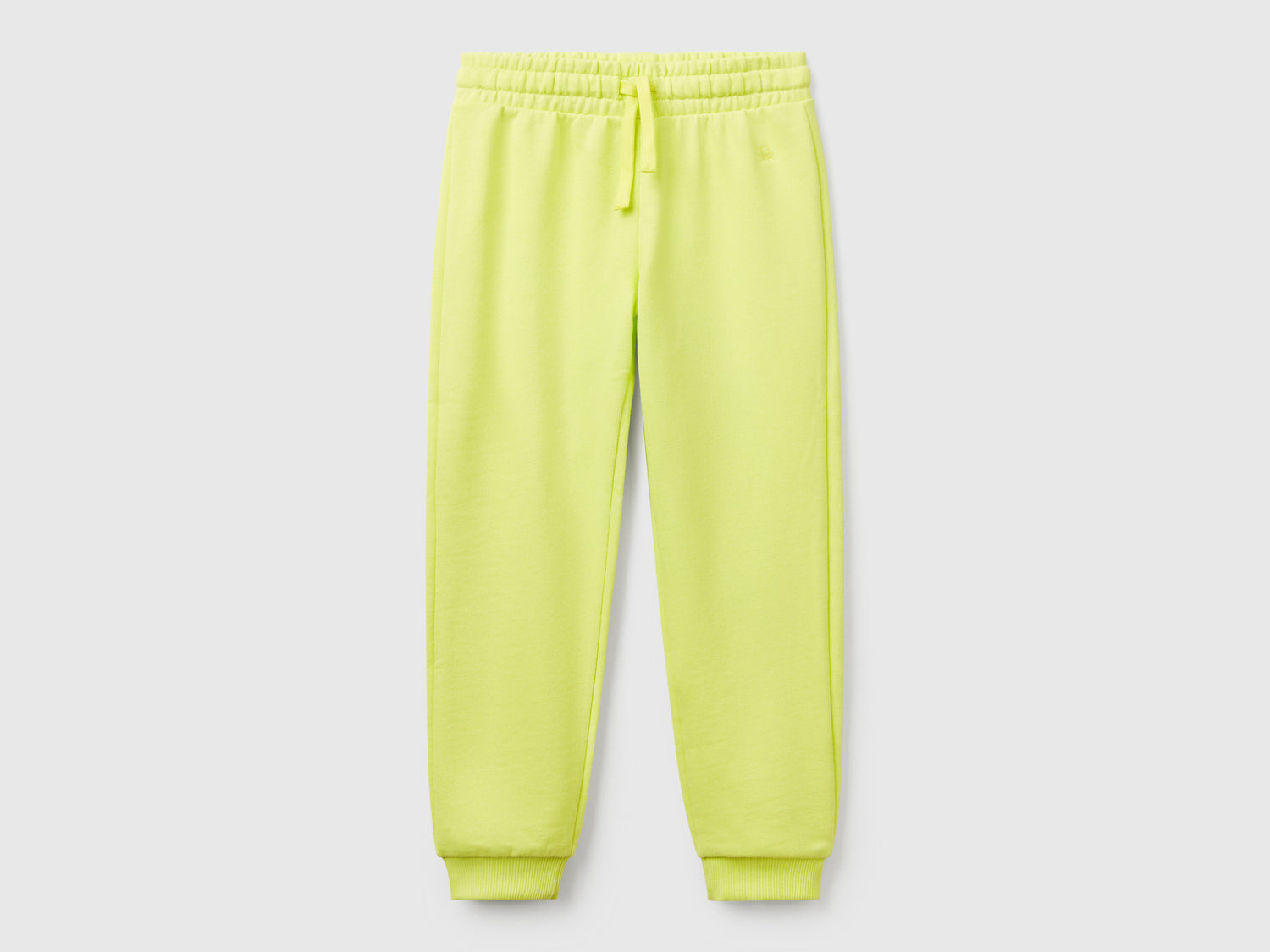 Pantaloni in felpa con logo da bambina lime | Benetton Outlet