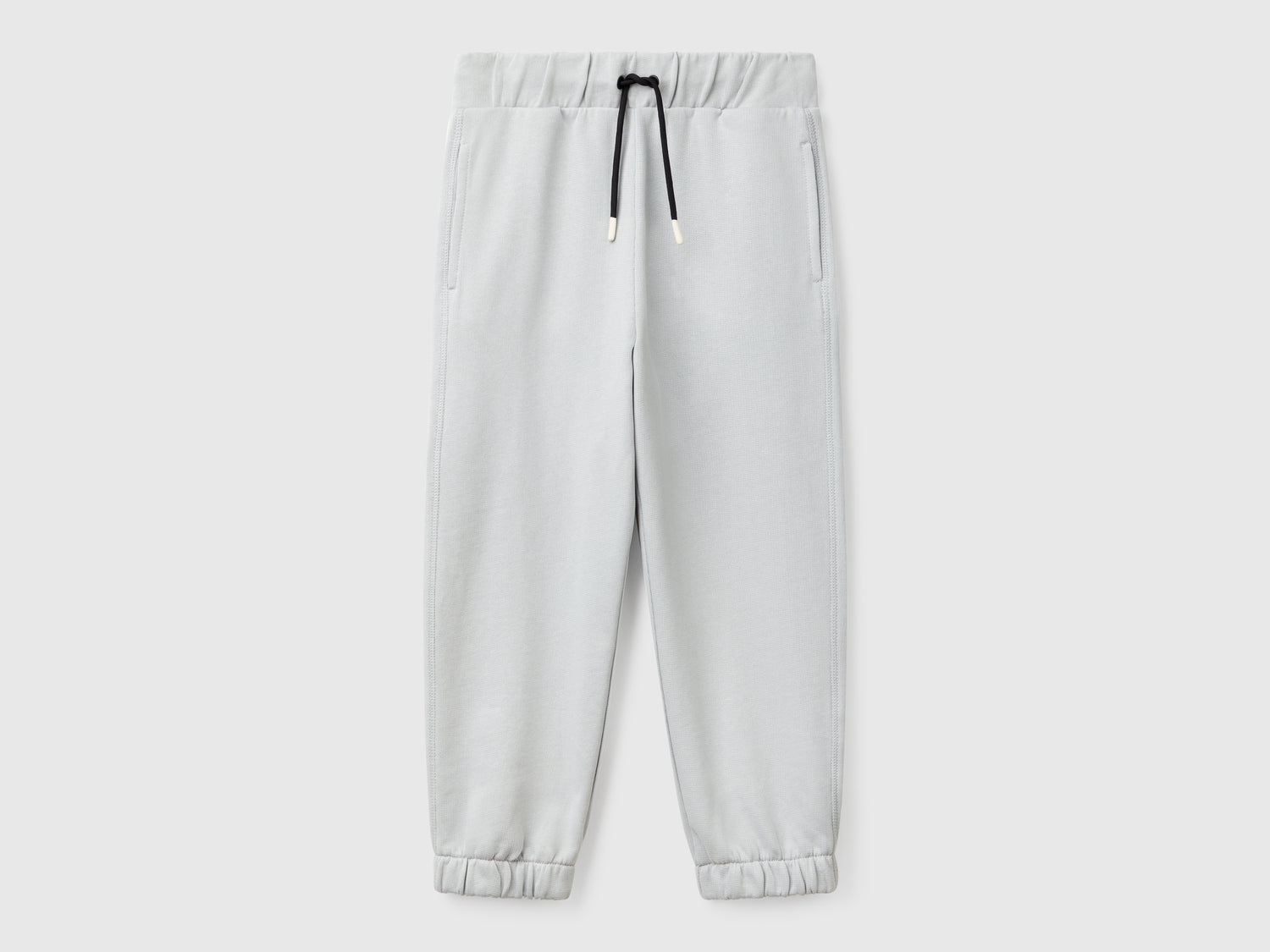 Joggers con stampa sul retro da bambino grigio | Benetton Outlet