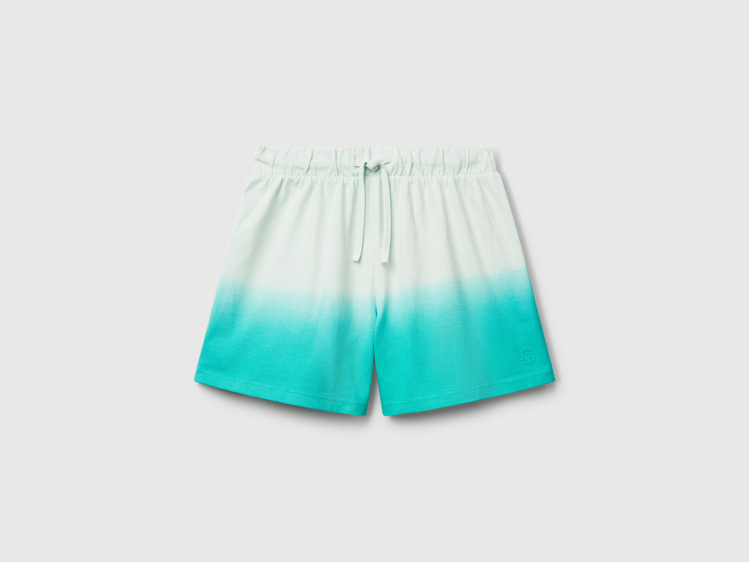 Shorts dip-dye da bambina verde acqua | Benetton Outlet
