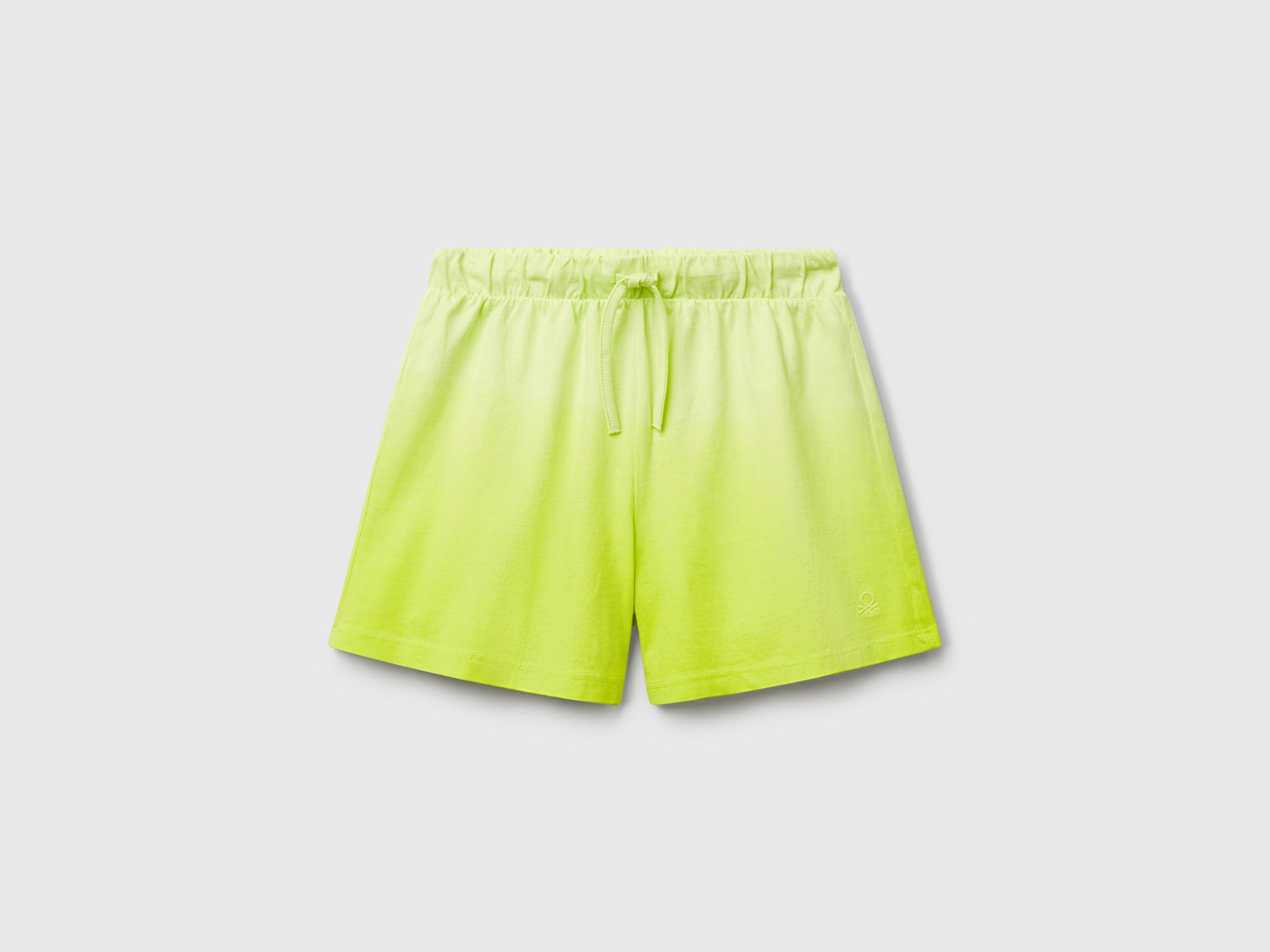 Shorts dip-dye da bambina giallo | Benetton Outlet
