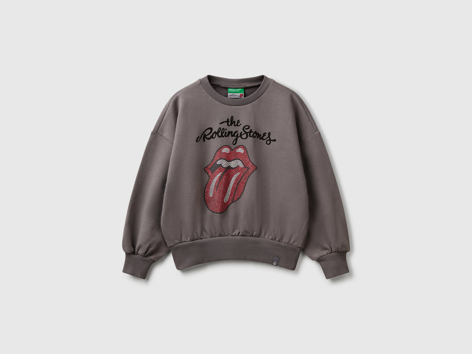 Felpa oversize "The Rolling Stones" con strass da bambina grigio scuro | Benetton Outlet