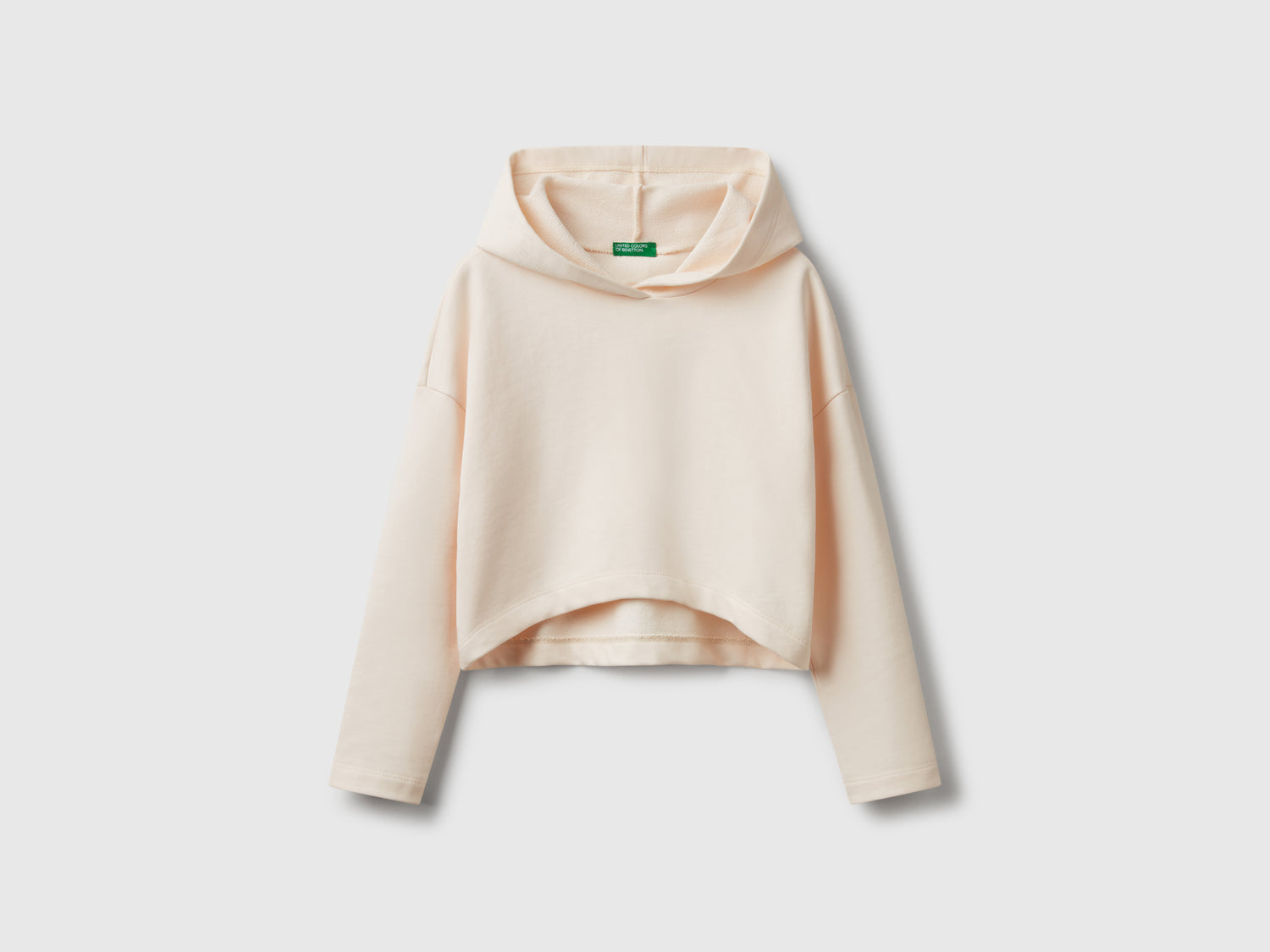 Felpa con fondo stondato da bambina bianco panna | Benetton Outlet