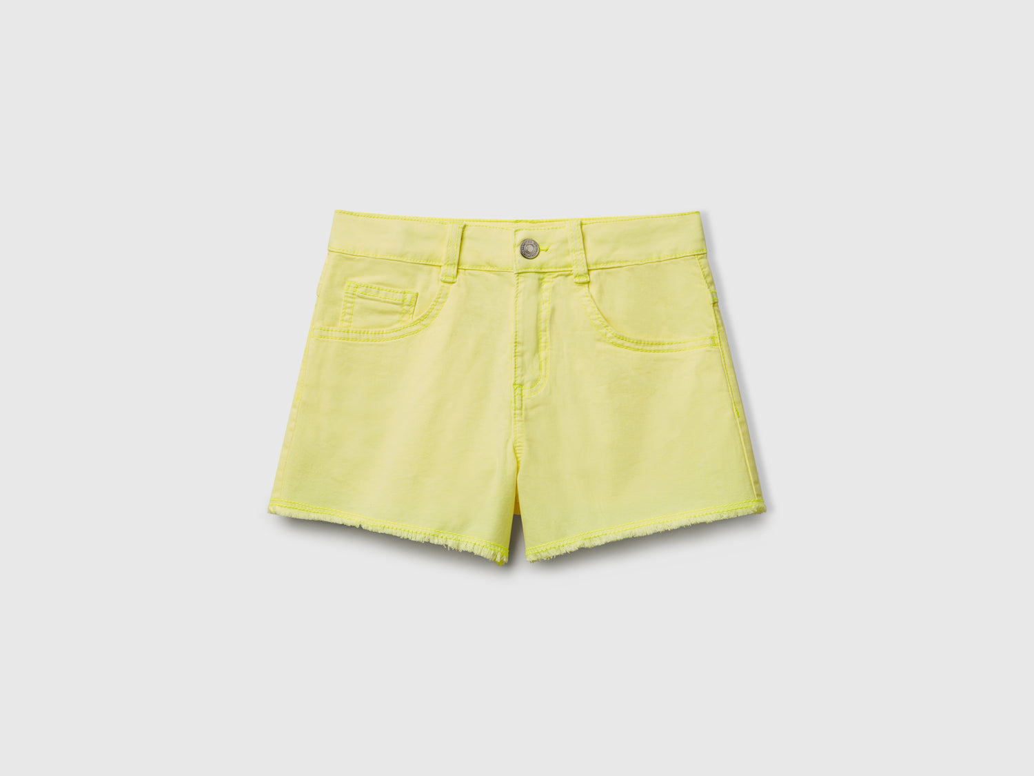 Shorts cinque tasche da bambina giallo fluo | Benetton Outlet