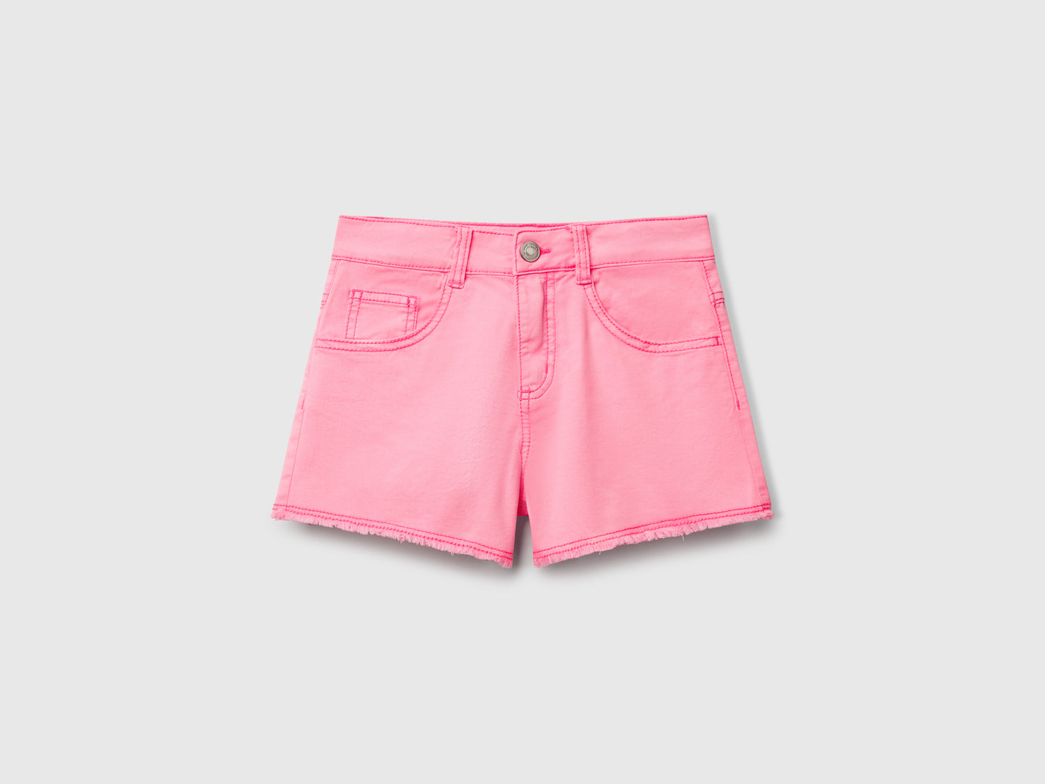 Shorts cinque tasche da bambina rosa fluo | Benetton Outlet
