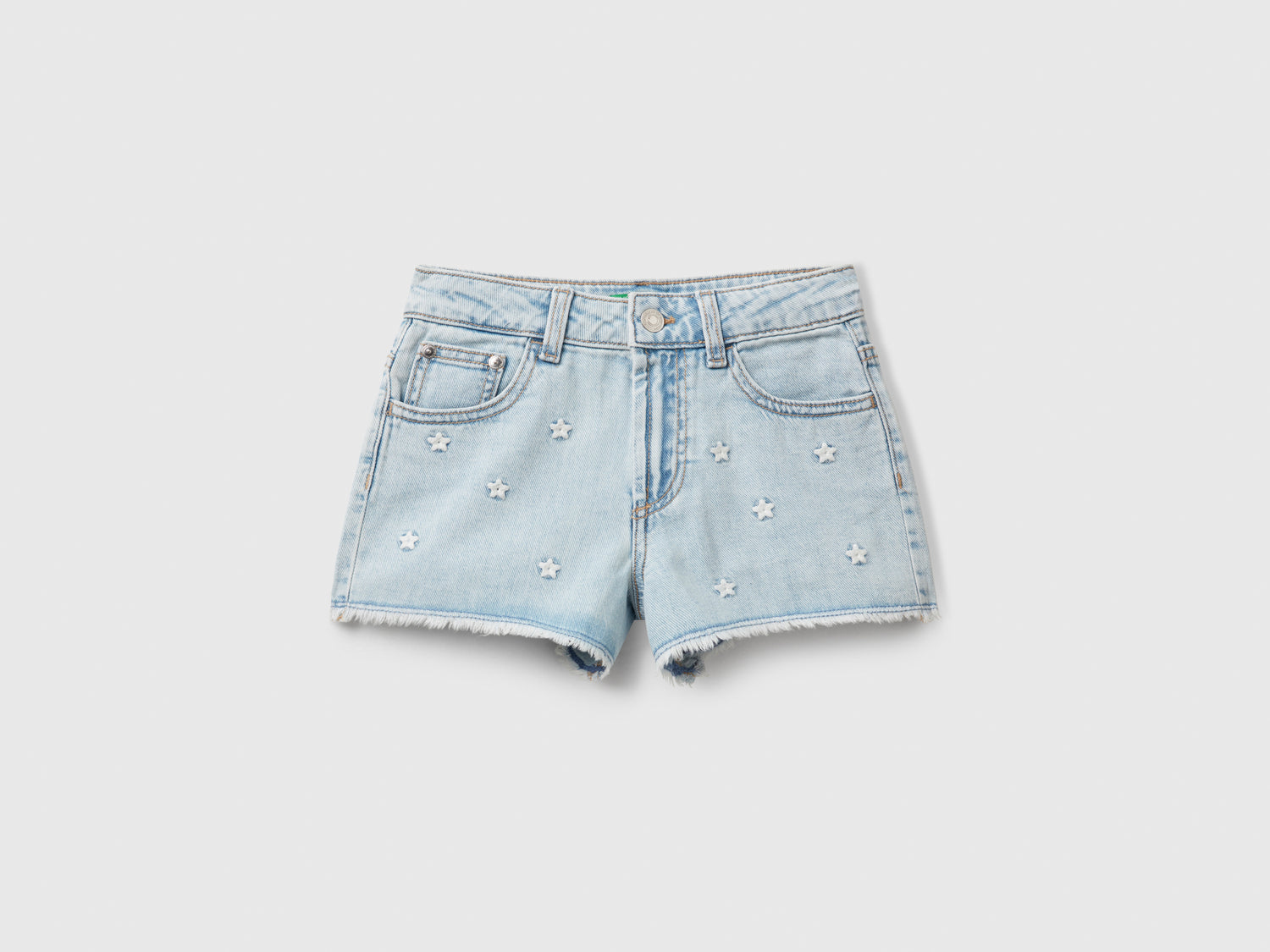 Shorts di jeans con ricami stelle da bambina azzurro | Benetton Outlet