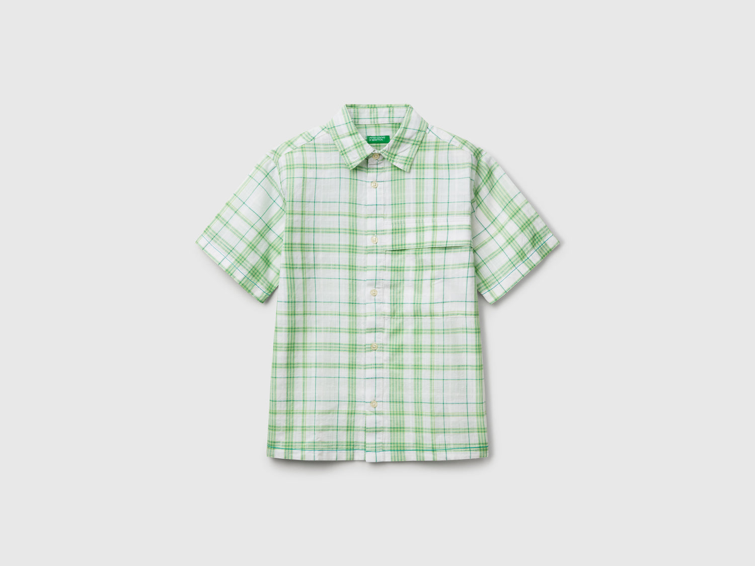Camicia over fit a quadri da bambino verde | Benetton Outlet