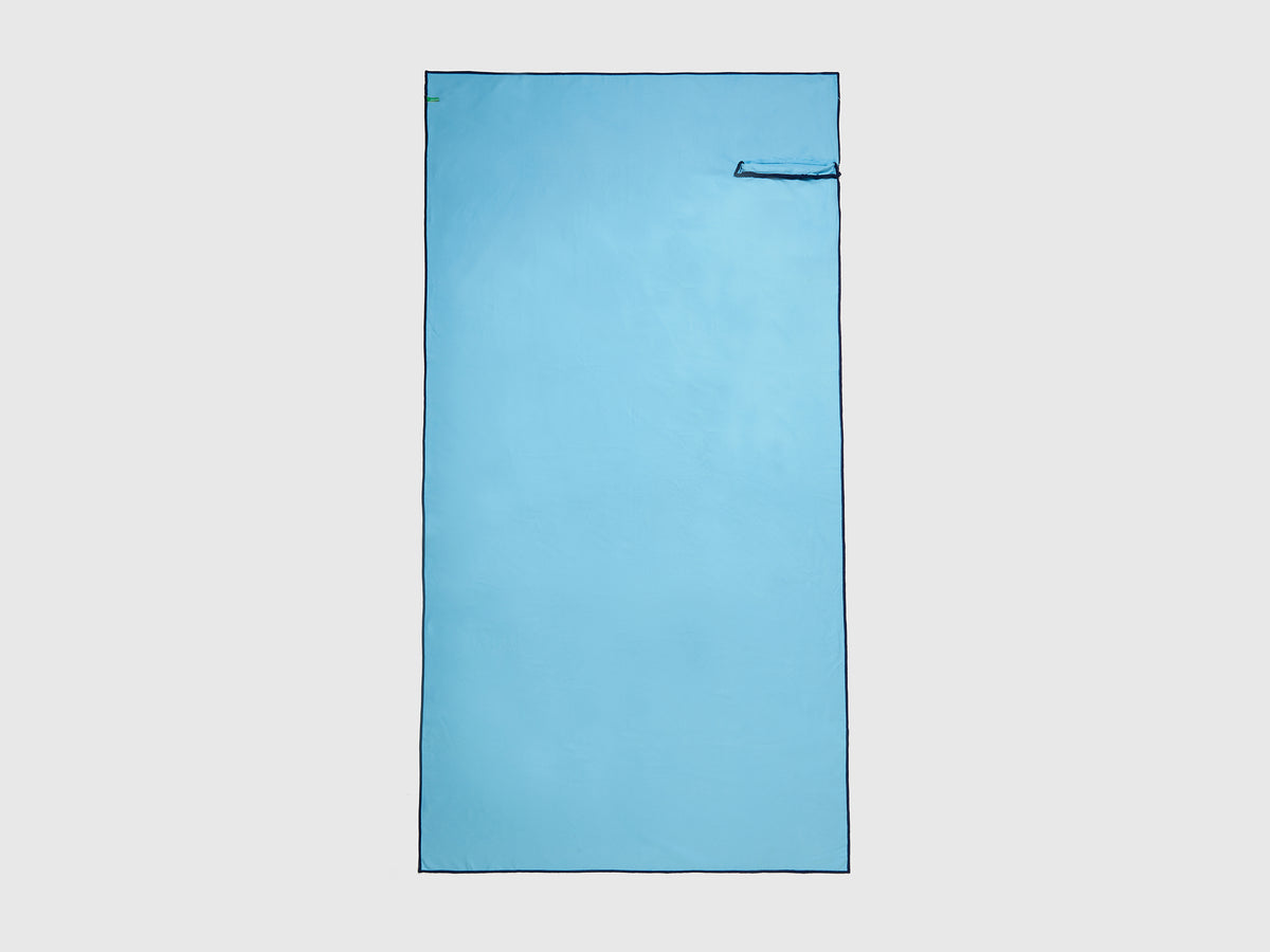 Beach towel with contrasting edge