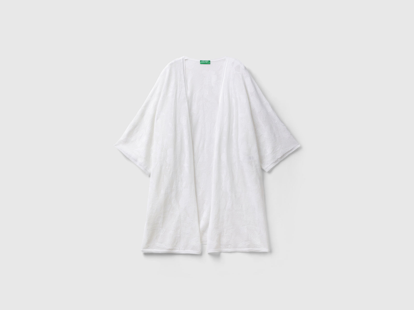 Cardigan lungo con motivo fiori da donna bianco | Benetton Outlet