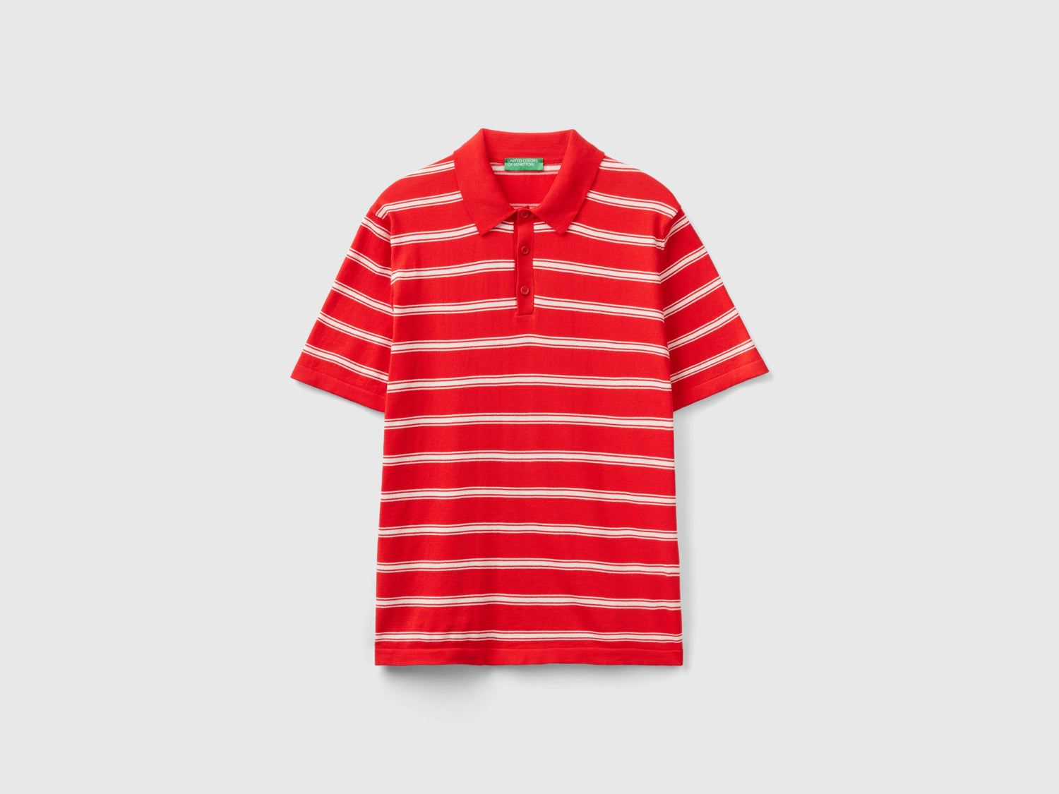 Striped knit polo da uomo rosso corallo | Benetton Outlet