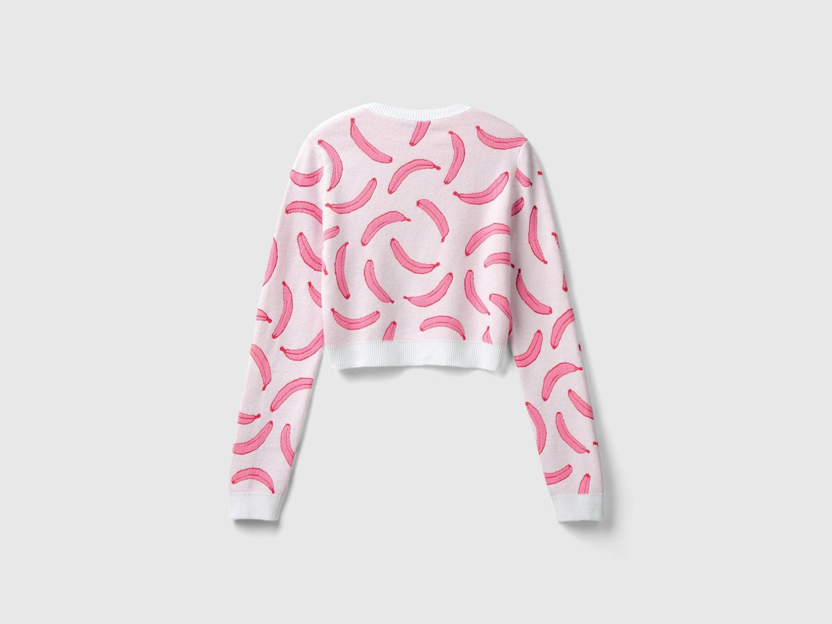Maglia cropped rosa chiaro con pattern banane