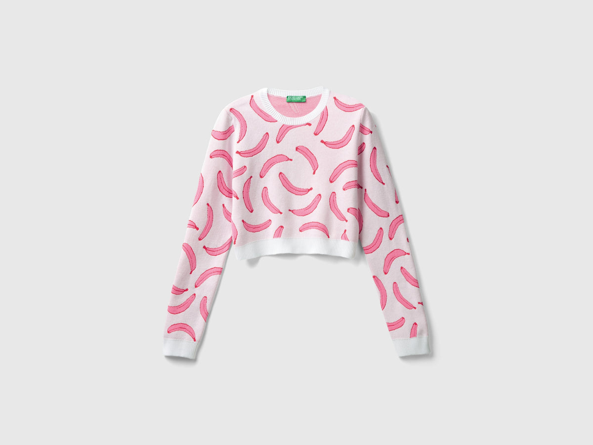 Maglia cropped rosa chiaro con pattern banane