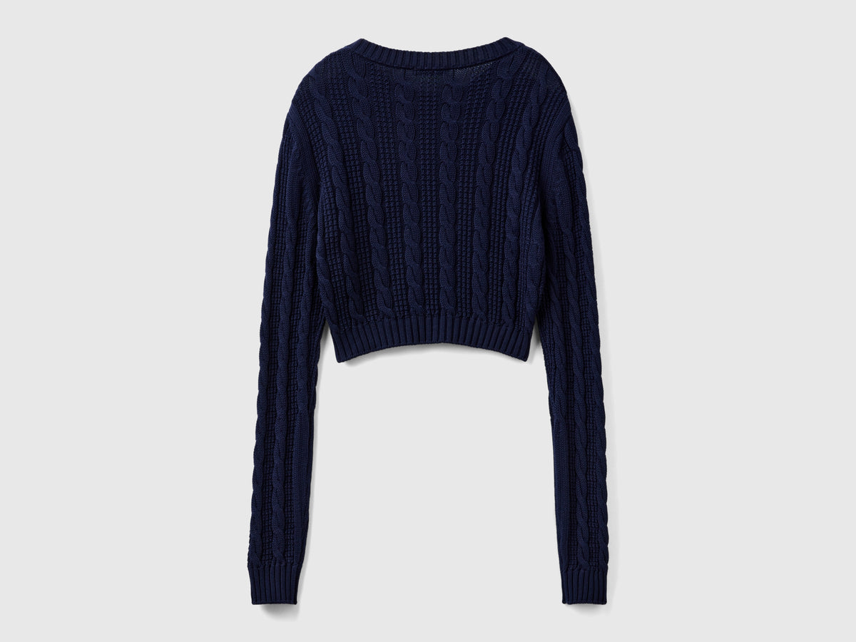 Cropped cable knit sweater