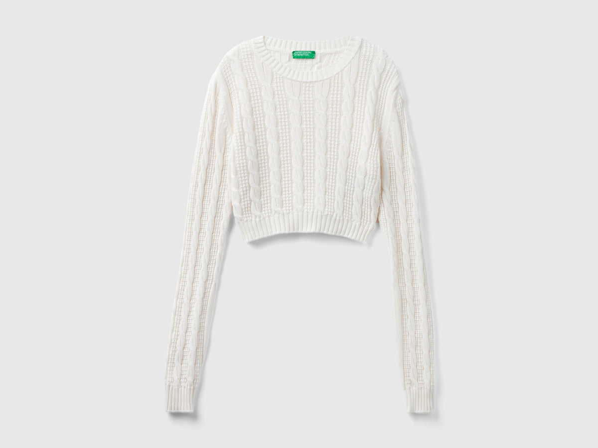 Cropped cable knit sweater