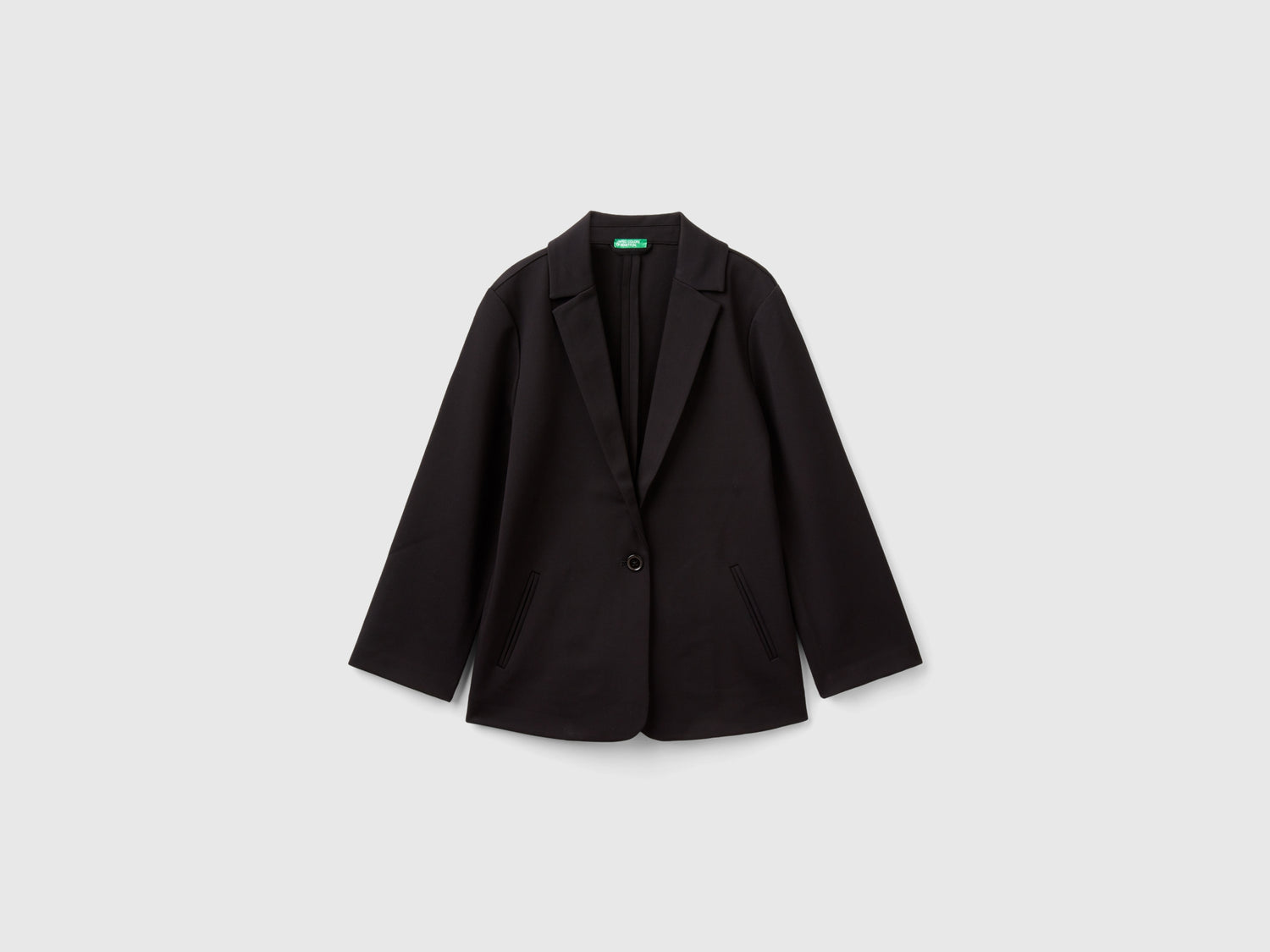 Blazer lungo elegante da bambina nero | Benetton Outlet
