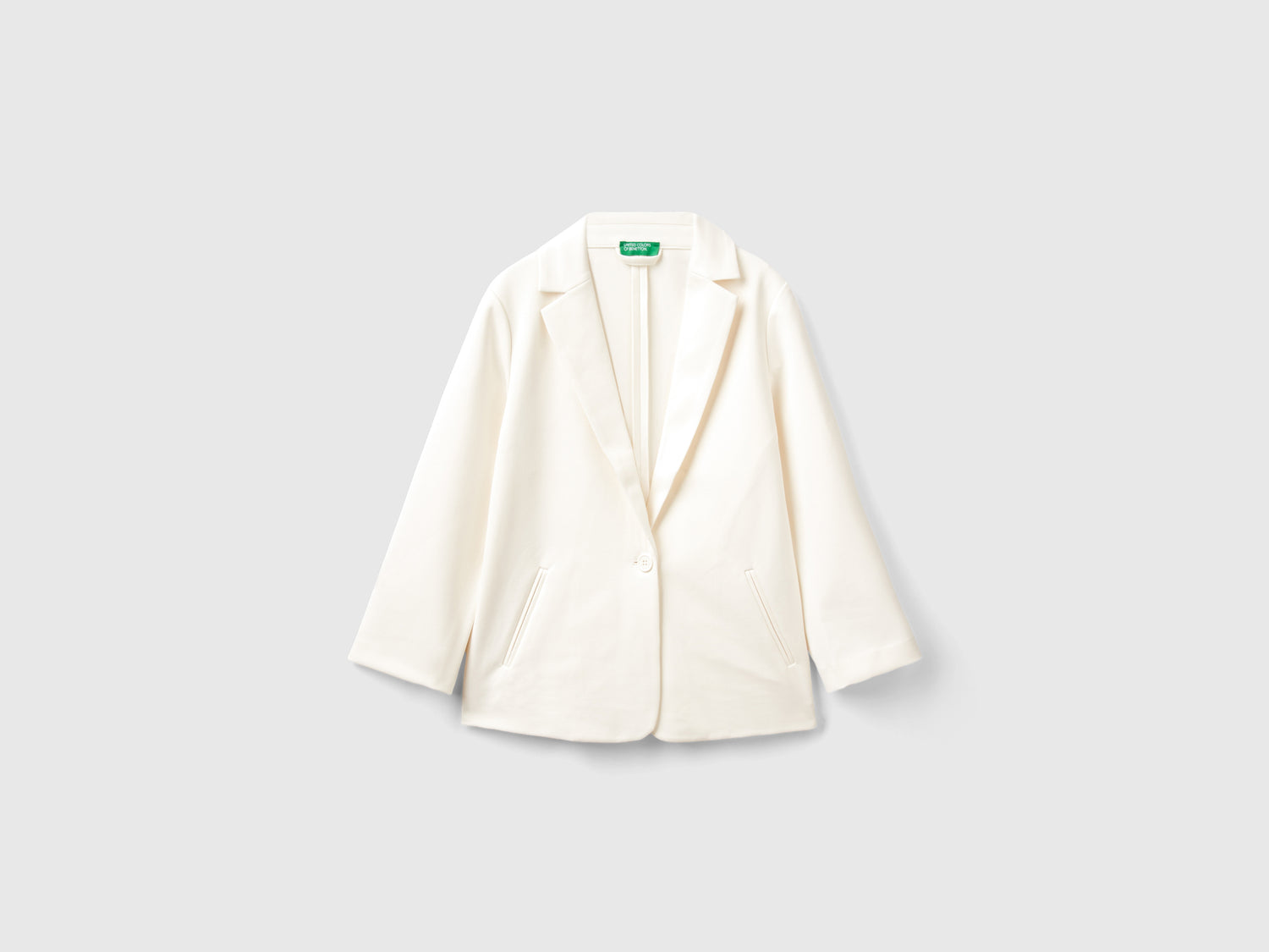 Blazer lungo elegante da bambina beige | Benetton Outlet