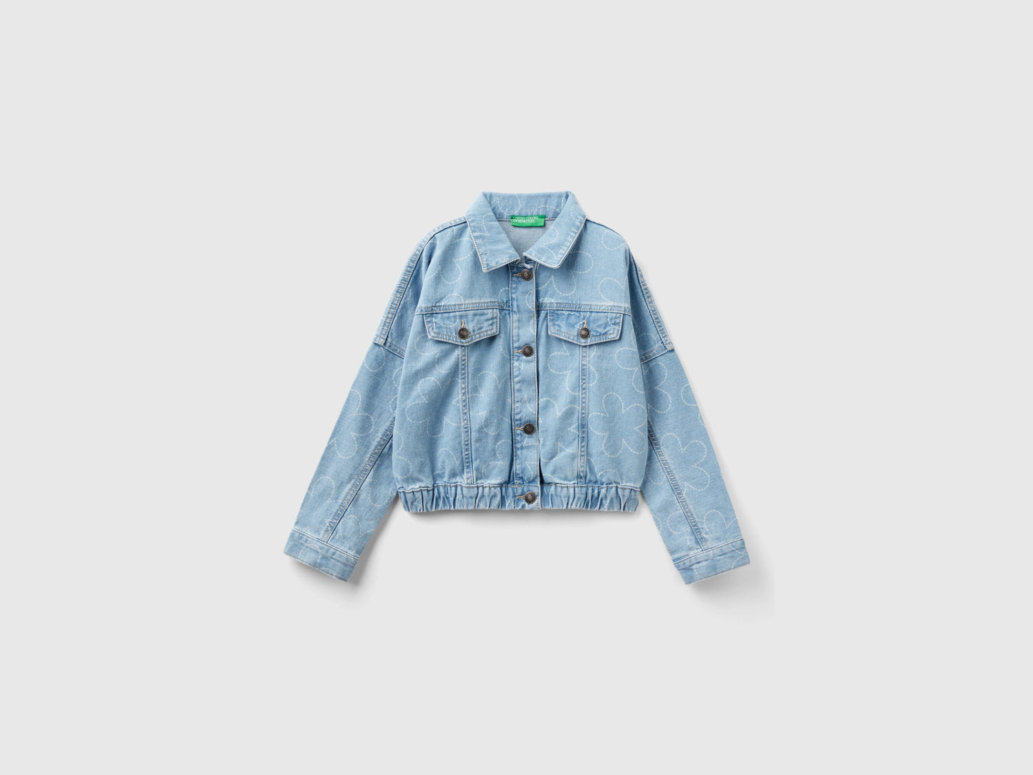 Giacca di jeans con stampa fiori da bambina celeste | Benetton Outlet