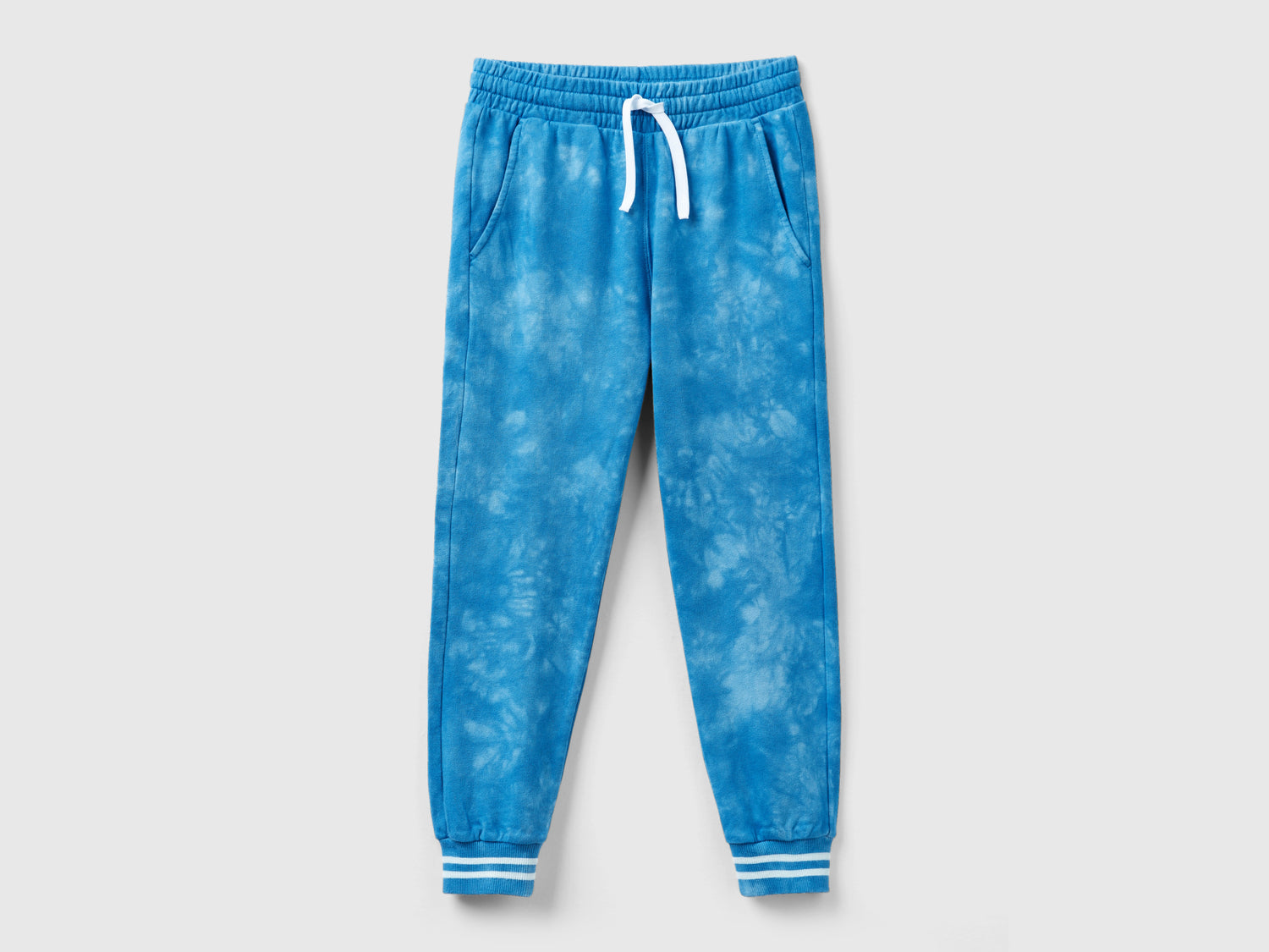 Pantaloni in felpa tye-dye da bambino azzurro | Benetton Outlet
