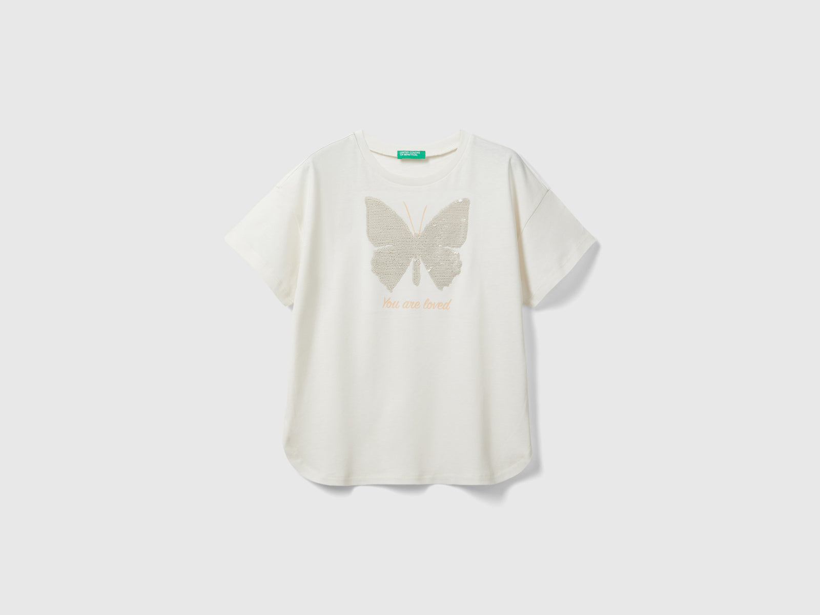 Maglietta con paillettes reversibili da bambina bianco panna | Benetton Outlet