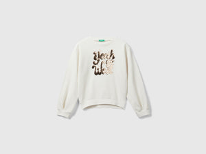 Felpa con paillettes reversibili