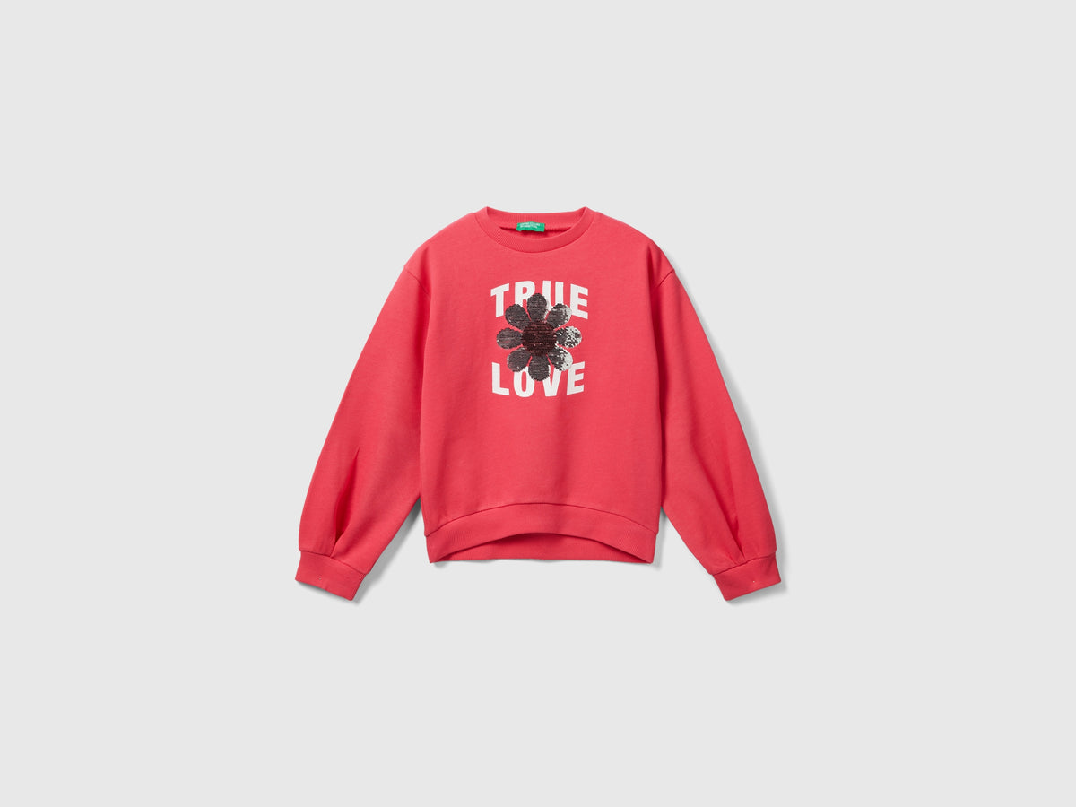 Felpa con paillettes reversibili