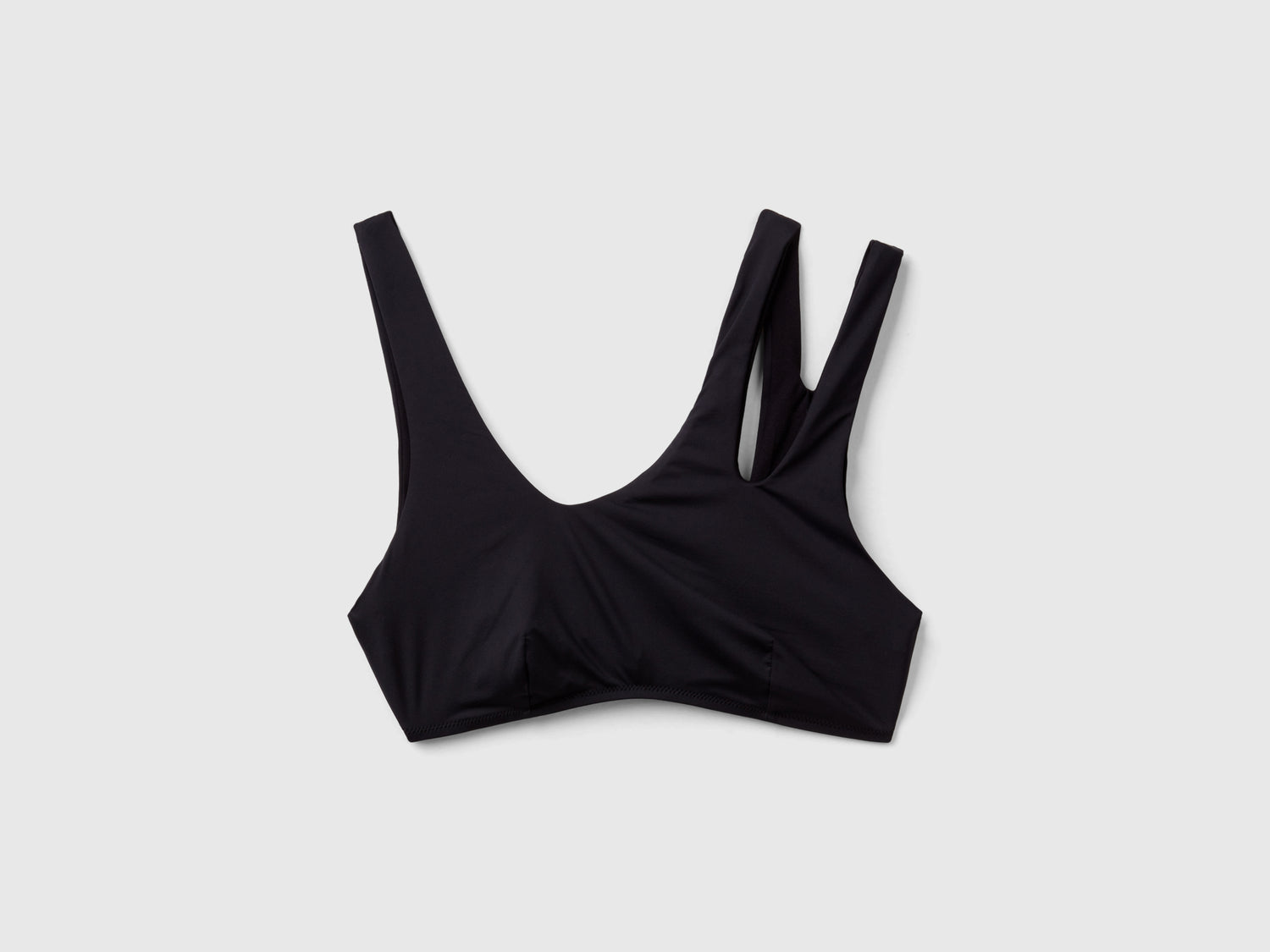 Cut out beach bra in ECONYL® da donna nero | Benetton Outlet