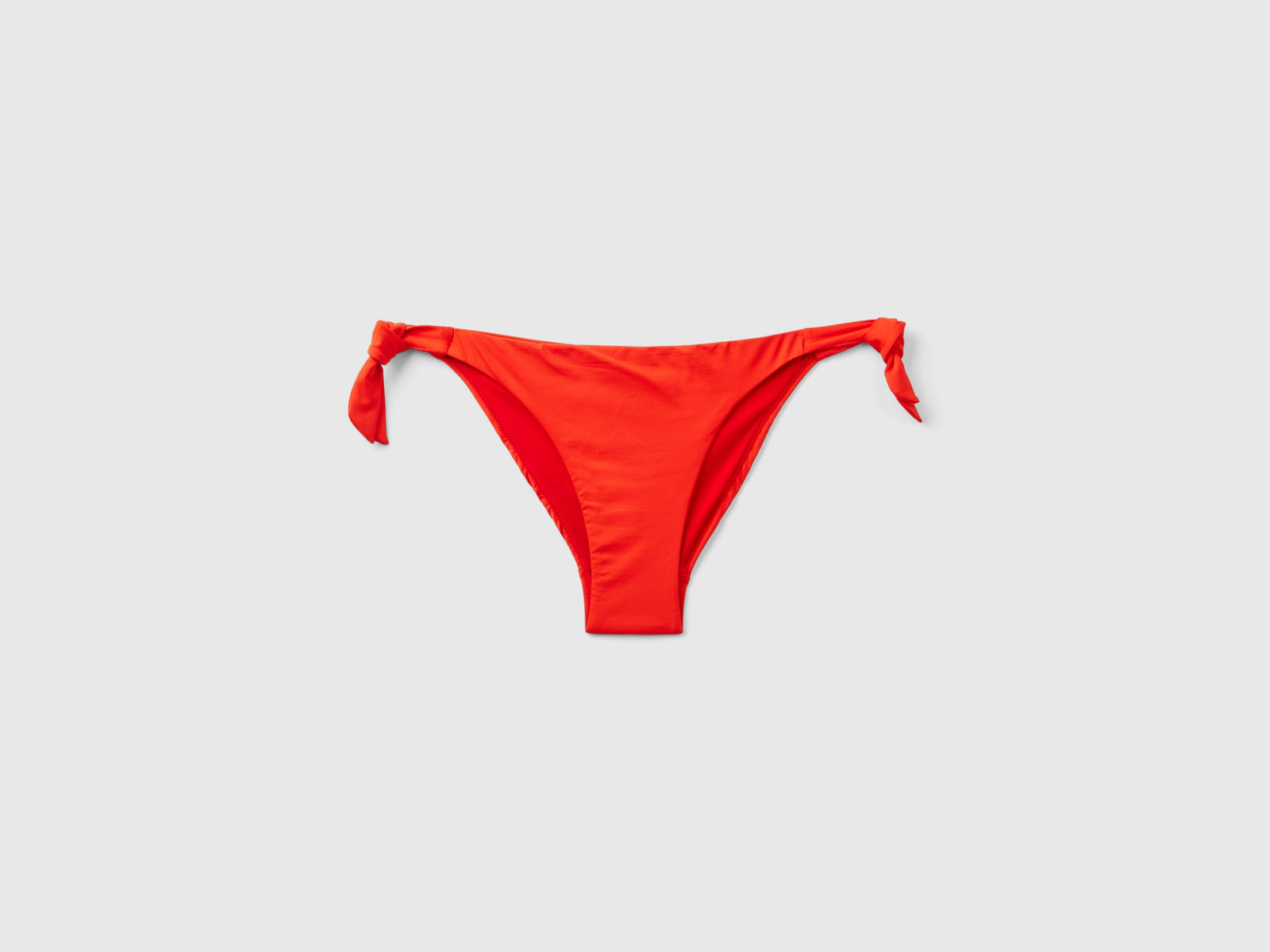 Slip mare in ECONYL® con fiocchi da donna rosso corallo | Benetton Outlet