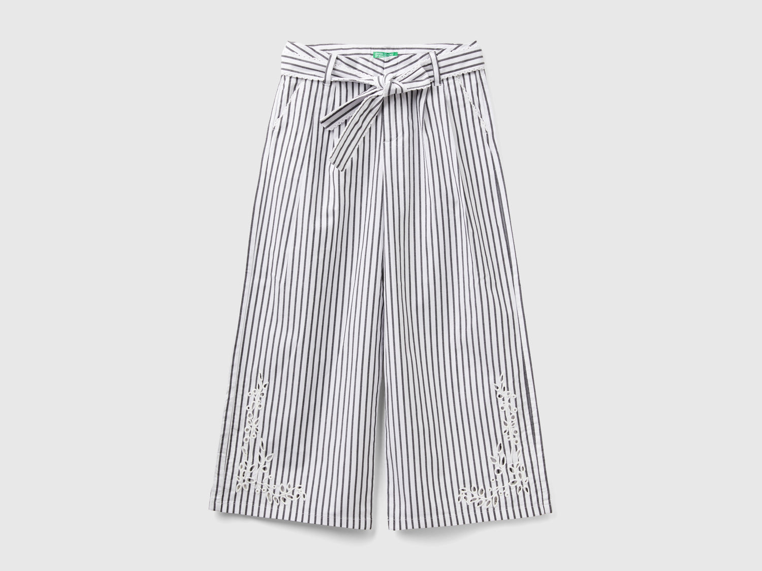 Pantaloni palazzo a righe da bambina nero | Benetton Outlet