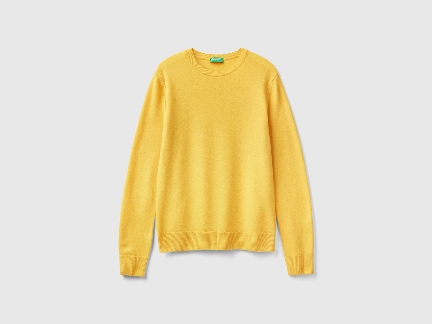 Maglia girocollo in lana Merino da donna giallo | Benetton Outlet