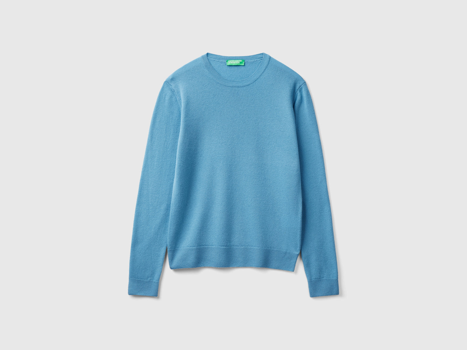 Maglia girocollo azzurra in lana Merino da donna azzurro | Benetton Outlet