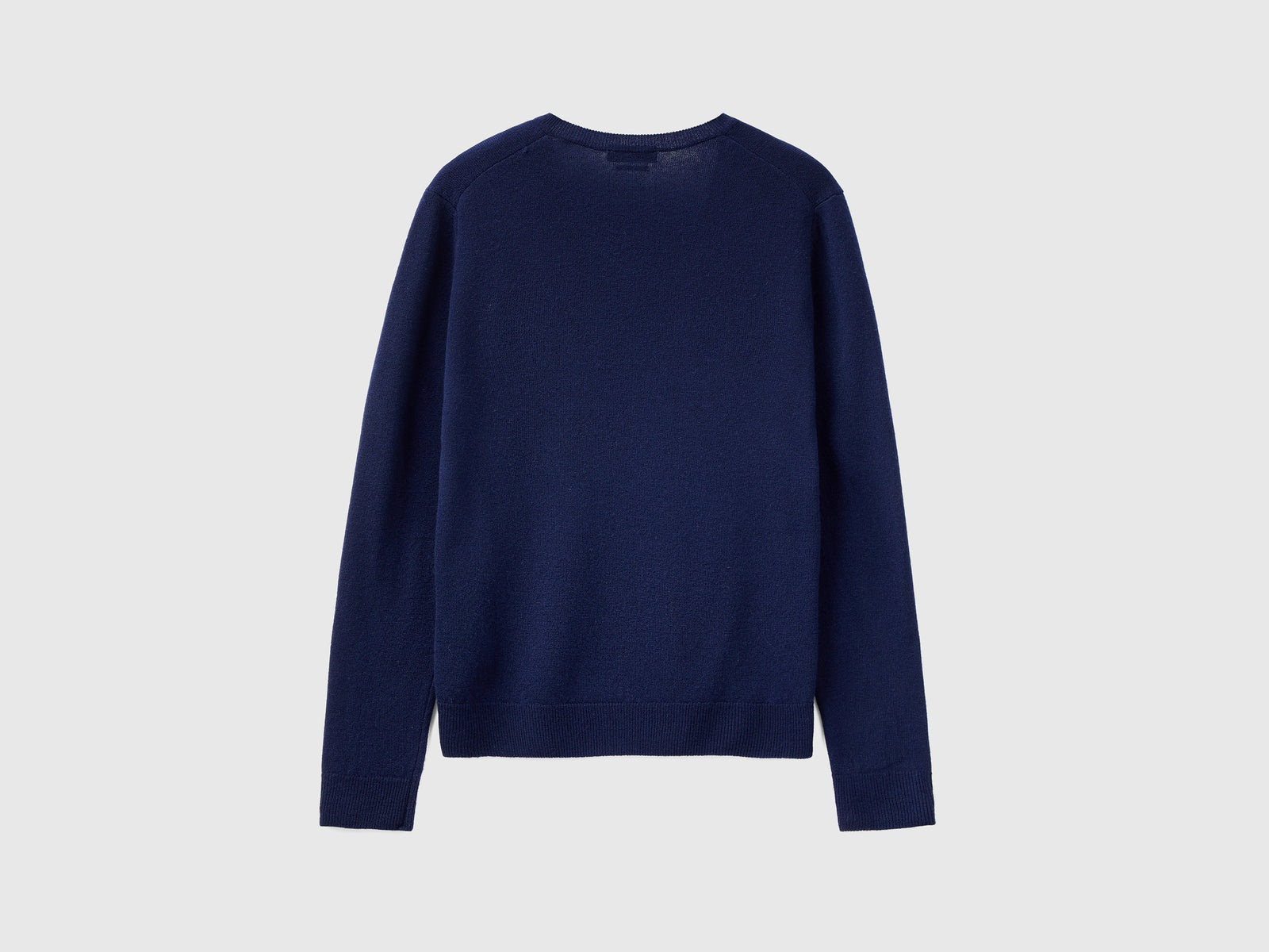V-neck sweater in pure Merino wool da donna blu scuro 2 | Benetton Outlet