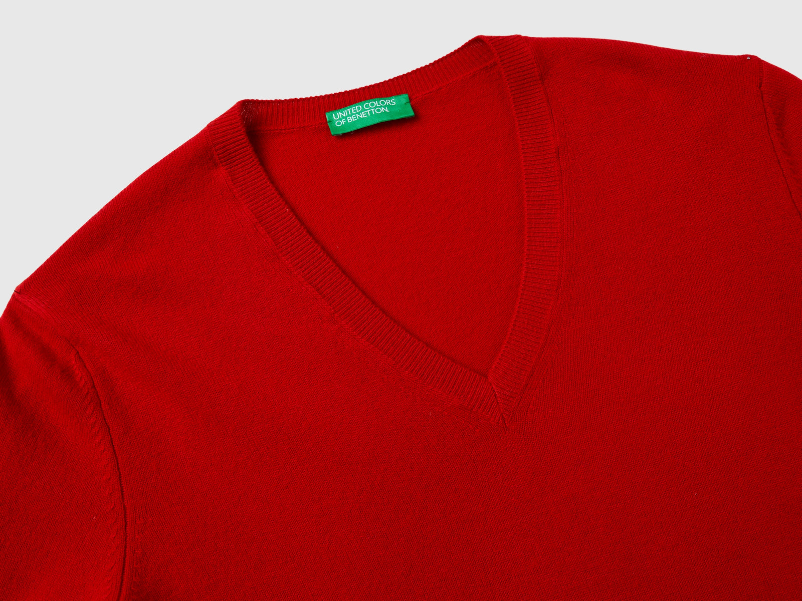 Maglia con scollo a V in pura lana Merino da donna rosso 3 | Benetton Outlet
