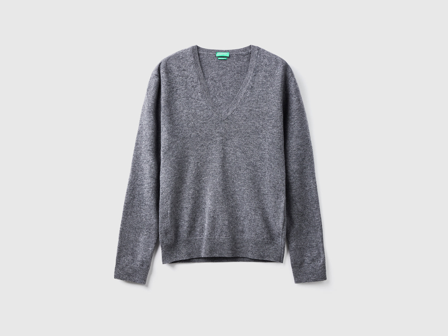 Maglia scollo a V in pura lana Merino da donna grigio scuro | Benetton Outlet