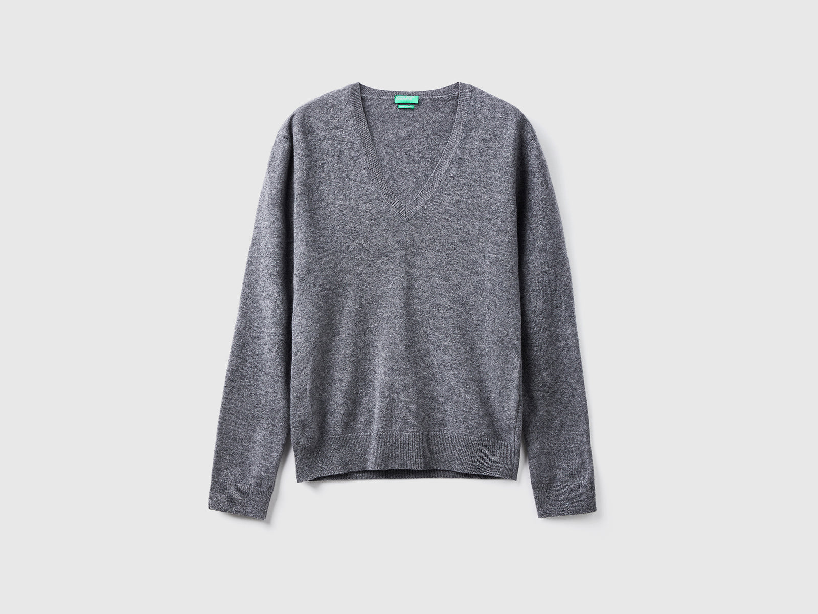 Suéter de cuello en V en pura lana merino da donna grigio scuro | Benetton Outlet