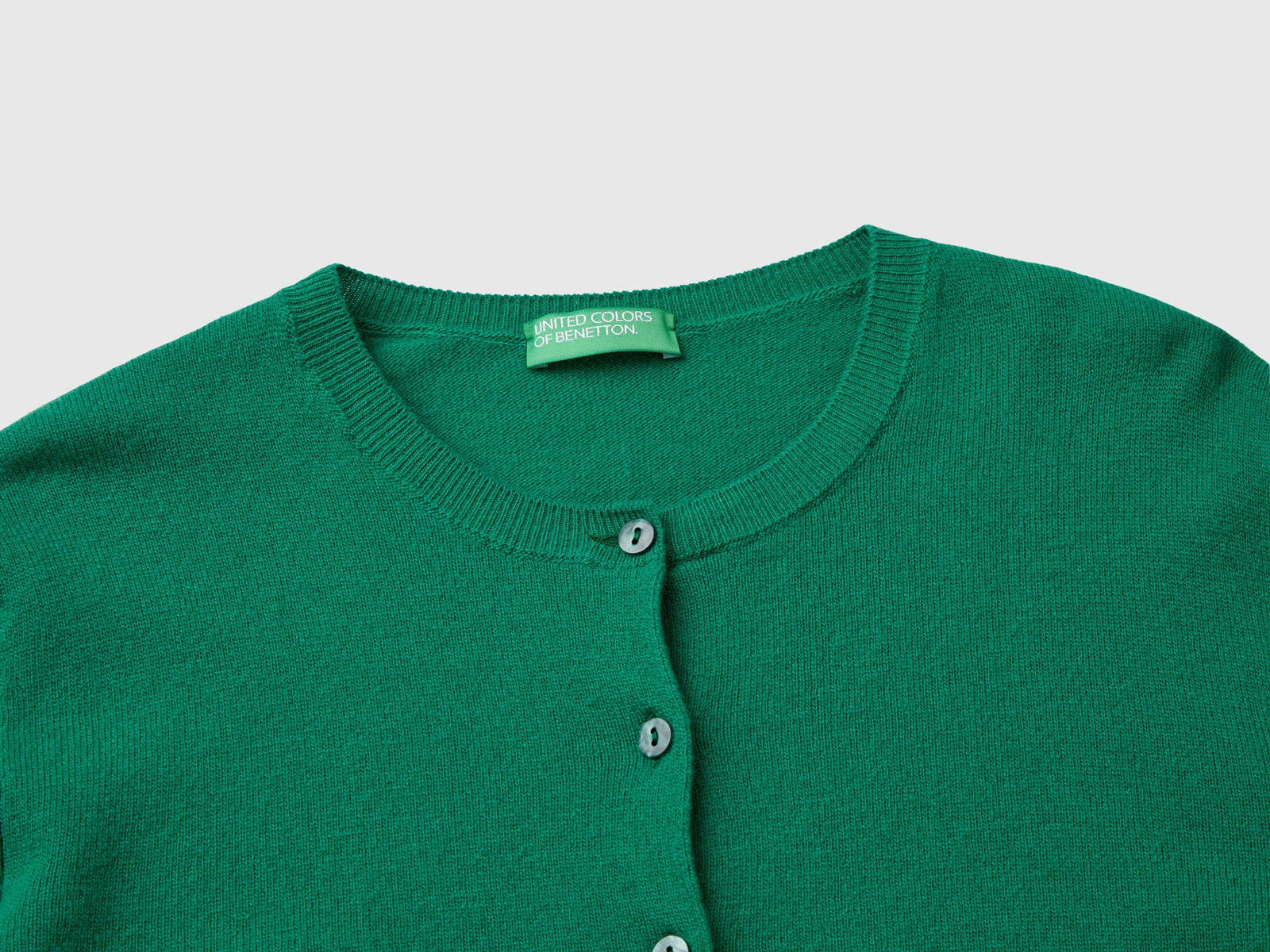 Cárdigan de cuello redondo de pura lana merino en el bosque da donna verde 3 | Benetton Outlet