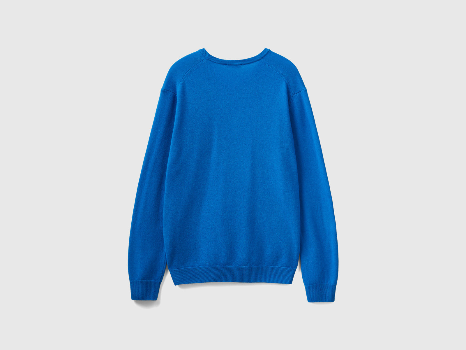 Maglia scollo a V in pura lana Merino da uomo bluette 2 | Benetton Outlet