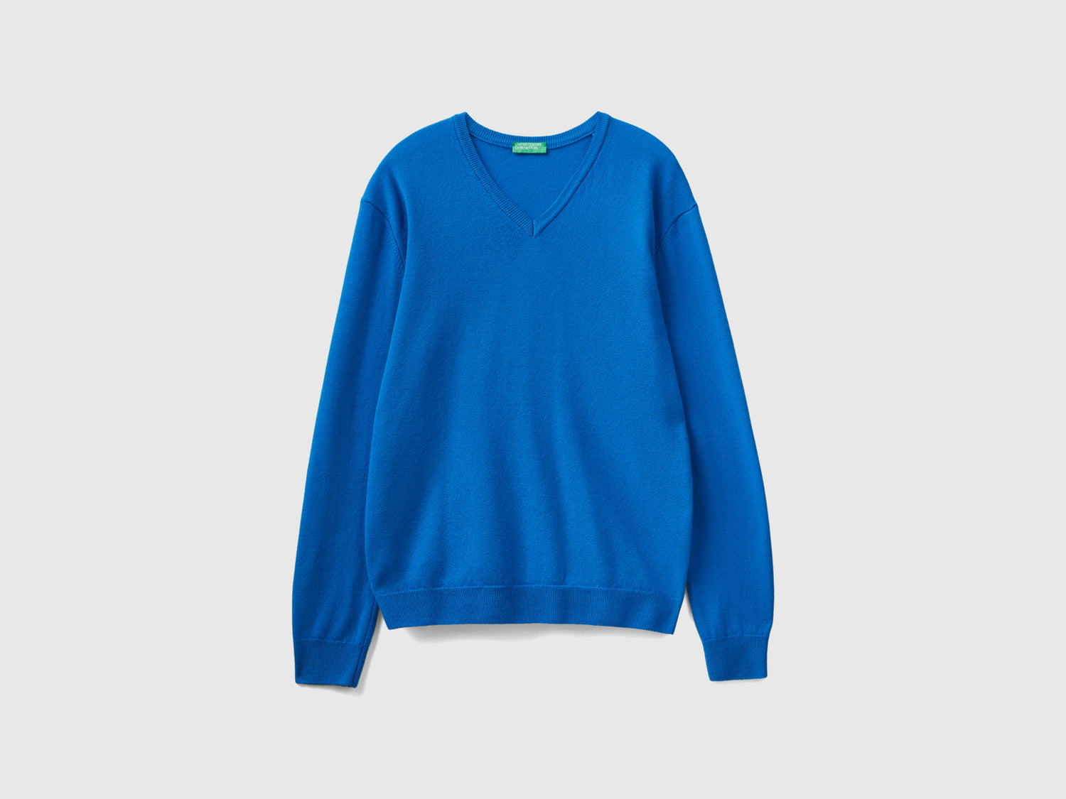 Maglia scollo a V in pura lana Merino da uomo bluette | Benetton Outlet