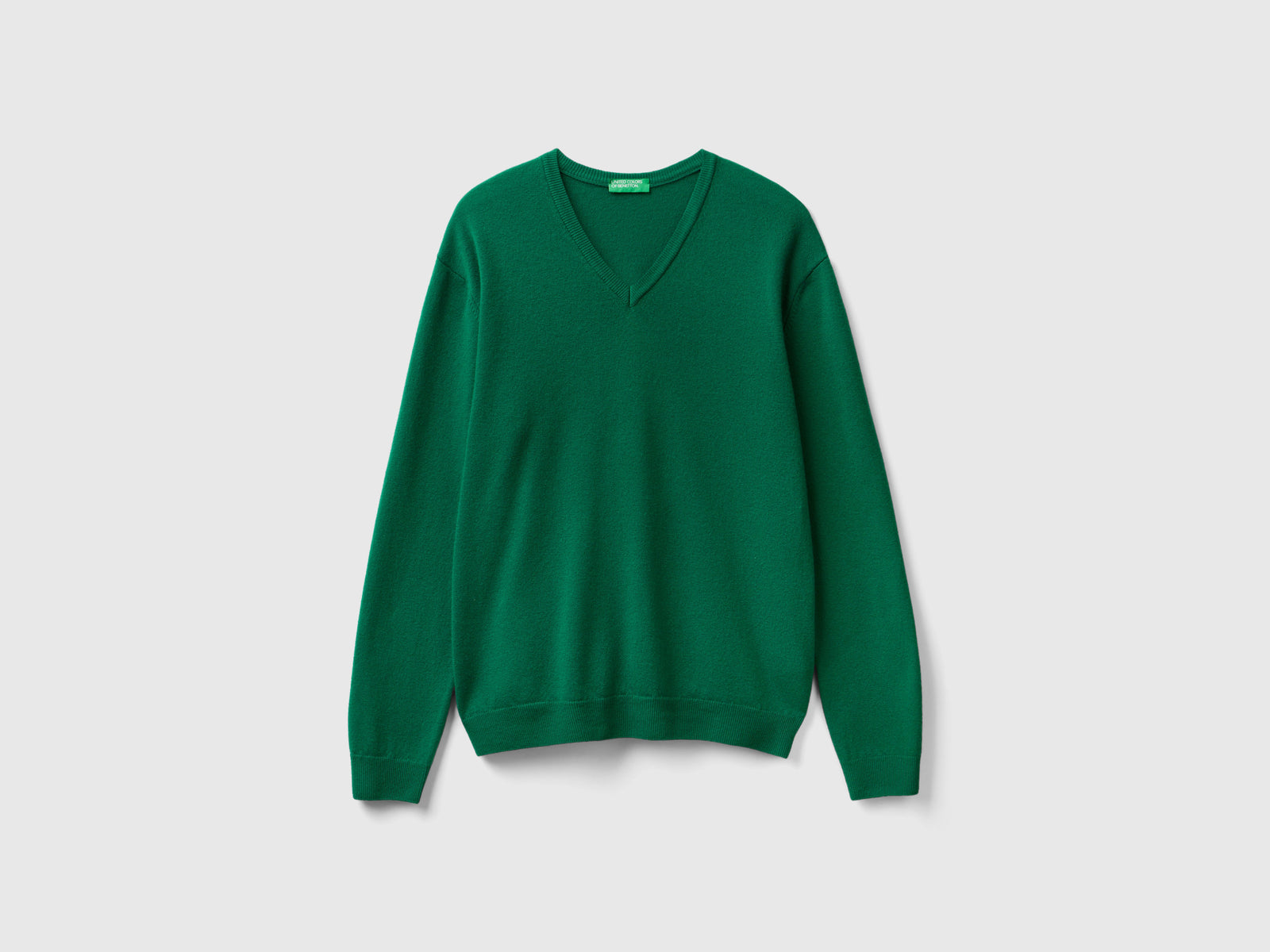 Maglia scollo a V bosco in pura lana Merino da uomo verde | Benetton Outlet
